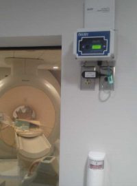 Oxygen monitor seen outside MRI room in a hospital.